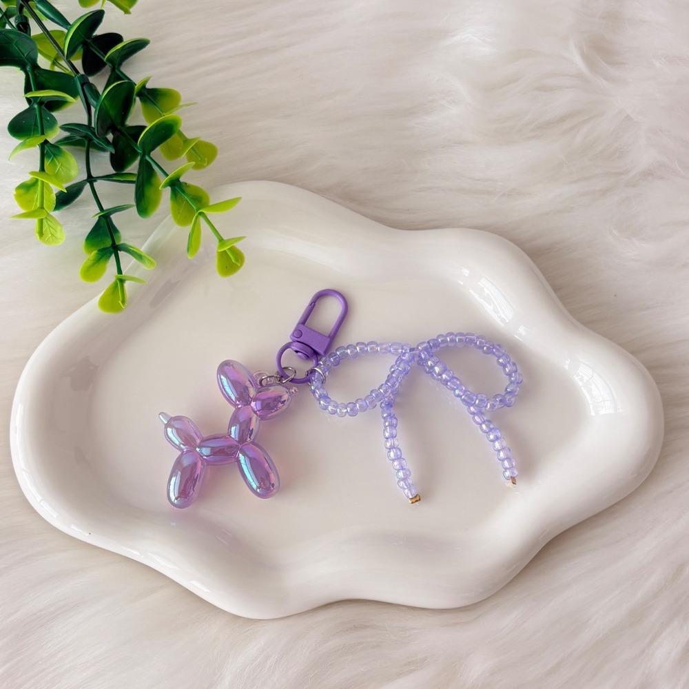Iridescent Purple Balloon Dog Keychain with Beaded Bow Charm Accessory